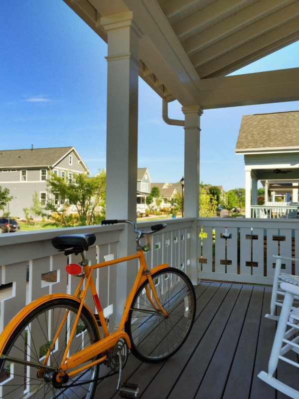 118243244476616_bike_on_porch_riverwalk_vertical_850